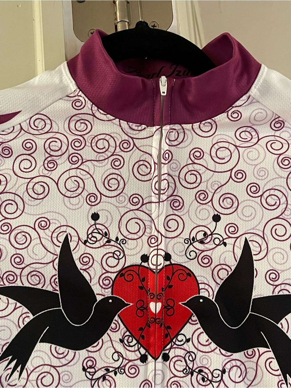 Pearl Izumi Women's White & Plum Cycling Jacket with Bird/heart motif size S